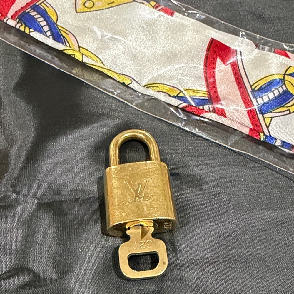 Louis Vuitton Gold lock and Key
